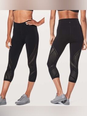 Women’s Lululemon Black Reveal Crop Interconnect 18” leggings size 4